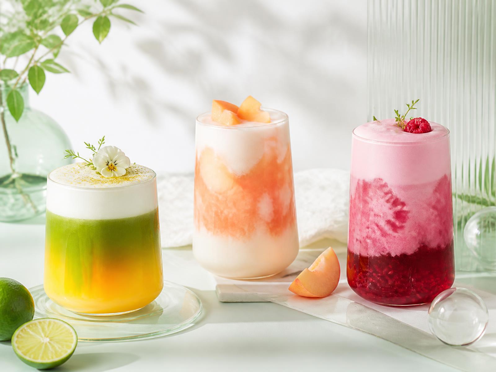 Three colorful Starbucks Nova specialty drinks