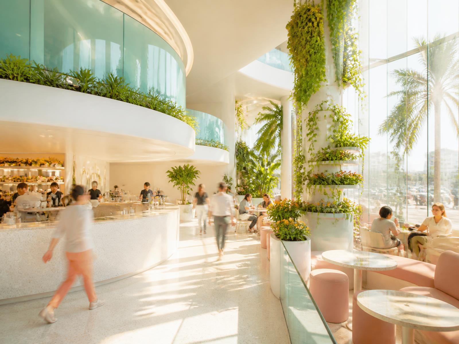Bright plant-filled Starbucks Nova store interior
